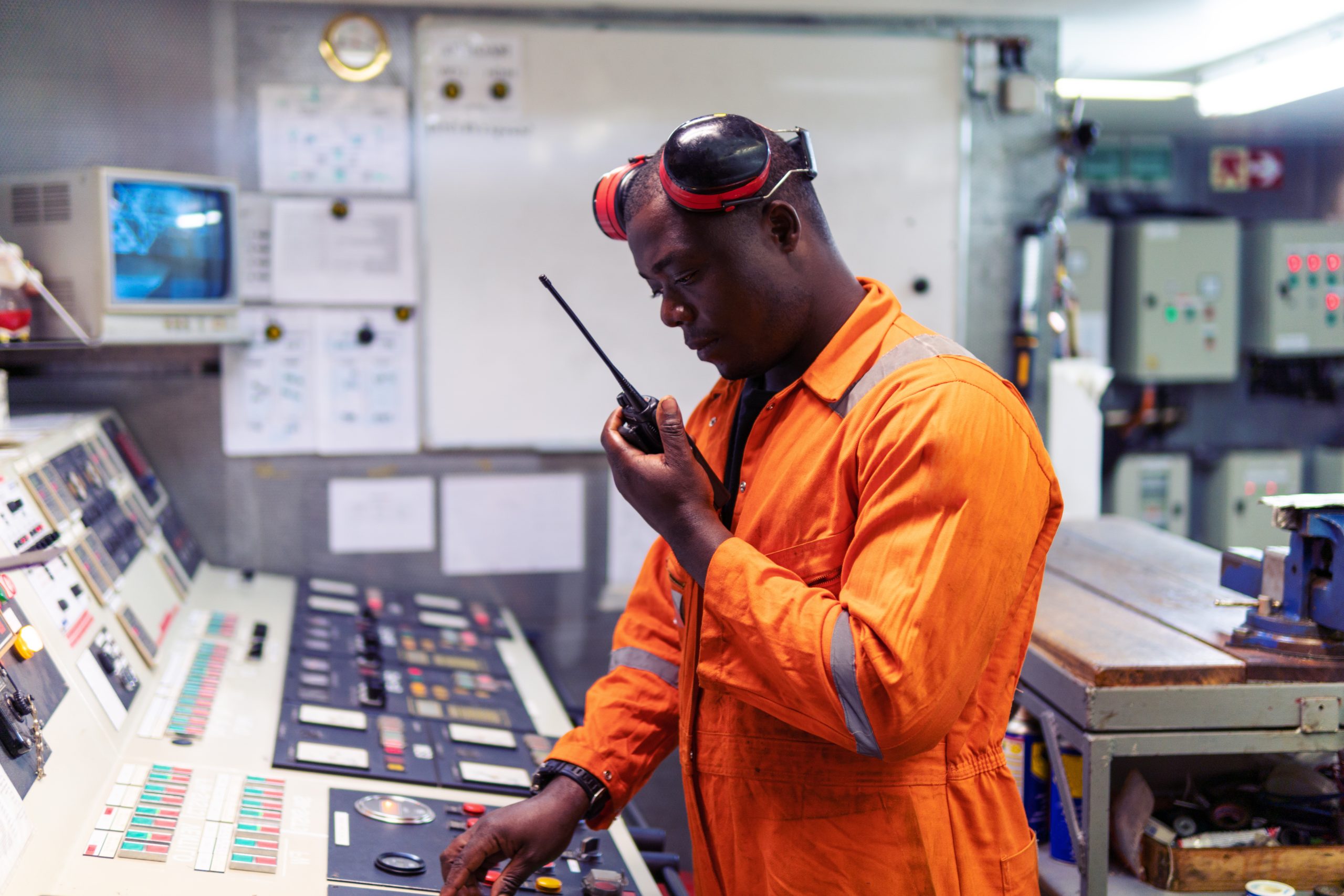 Marine Engineer Officer Working In Engine Room